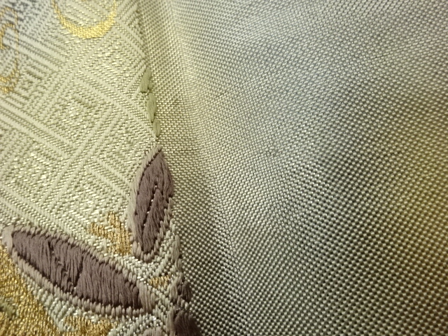  笹に蔓草・鶴・流水模様織出し袋帯